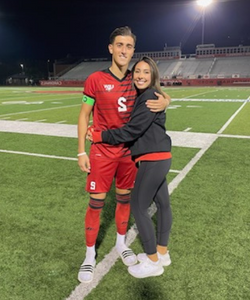 Lars Willems hugs Lauren Mancha after soccer game